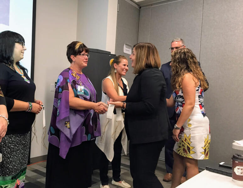 Saltfleet principal Christine Nicolaides receives her school’s wampum.